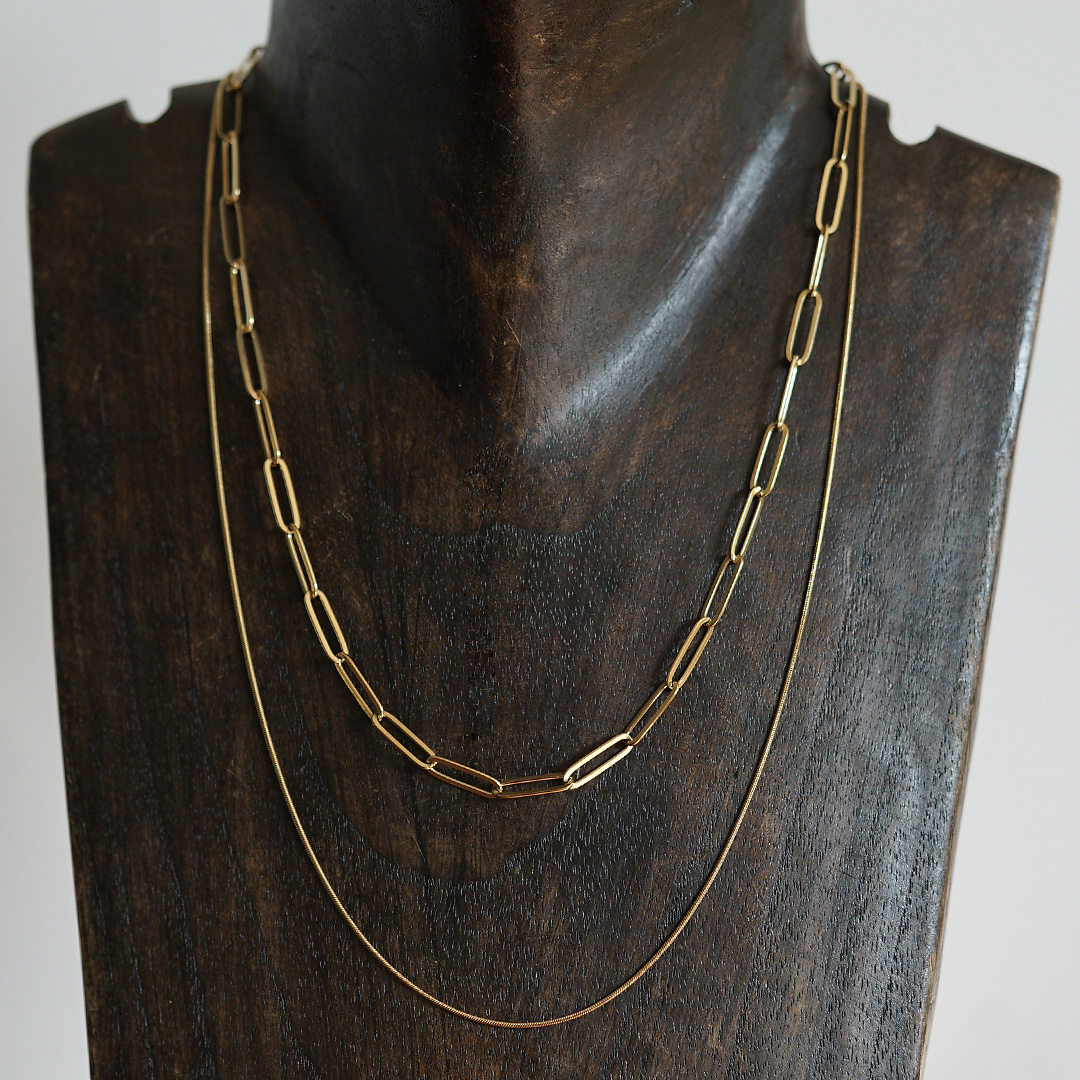 dubbele ketting snake closed forever goud 1220 03g snake pimpsandpearls pim borstbeeld